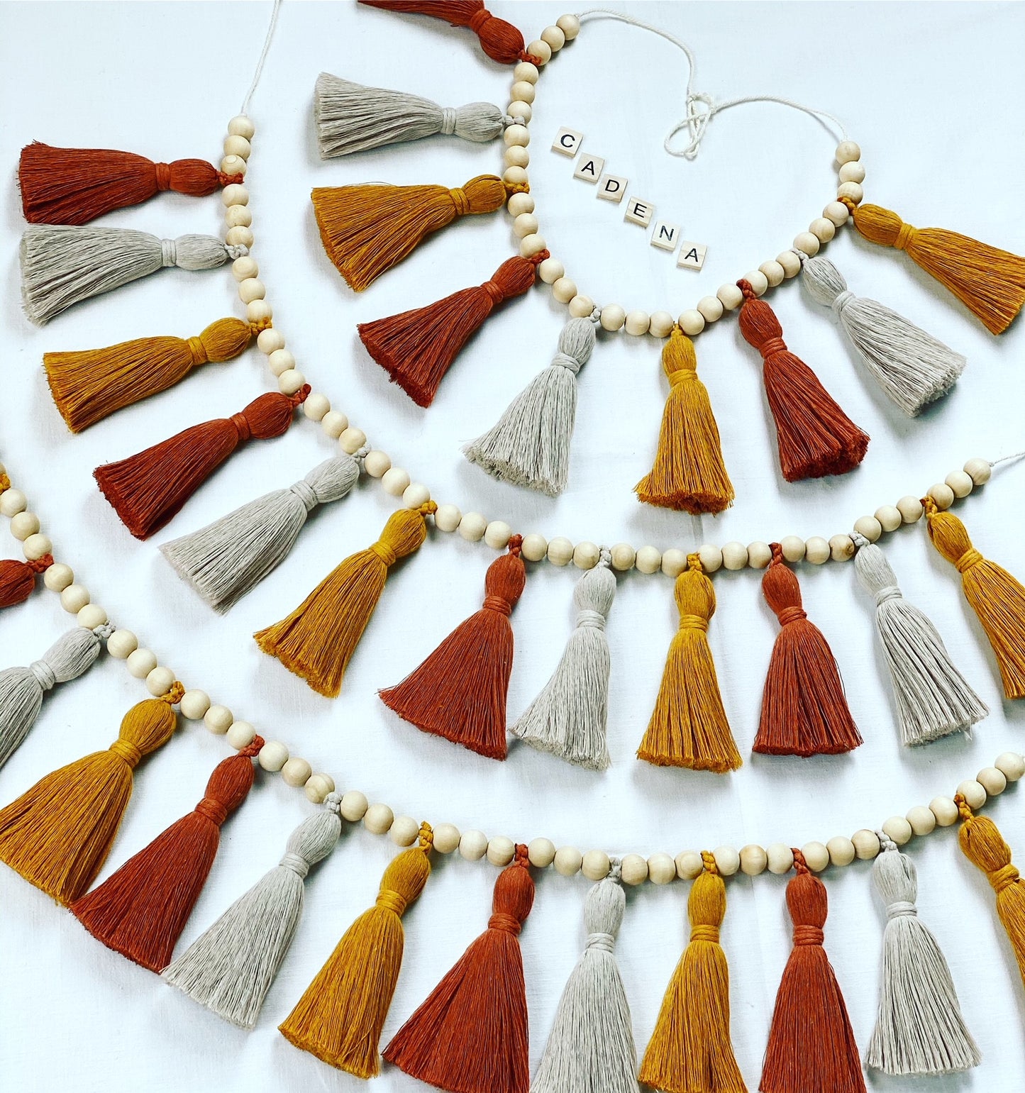 Girlande "Tassel - Senfgelb" (Holzperlen & Bio-Baumwolle)