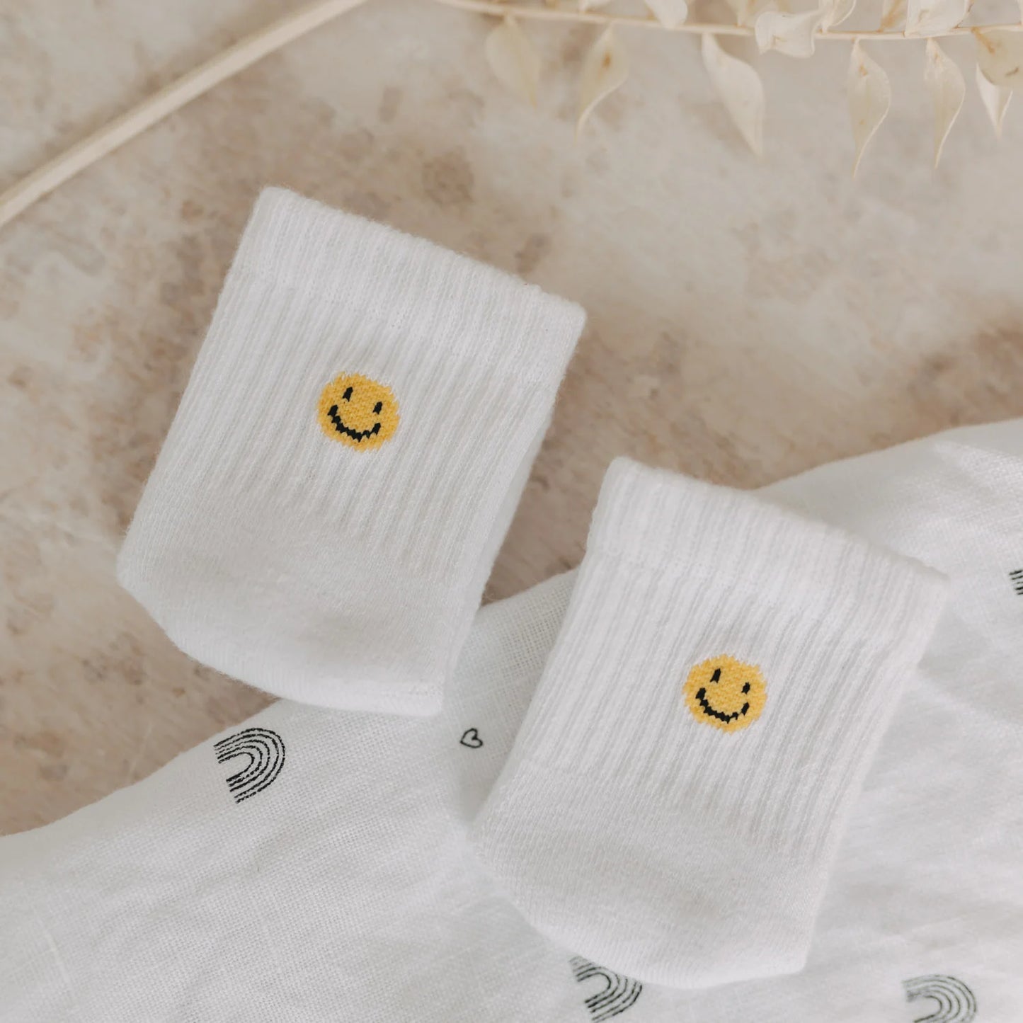 Eulenschnitt Babysocken "Smiley" (Weiß)