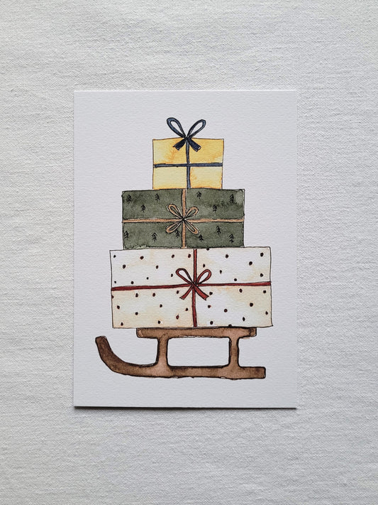 Postkarte "Geschenkeschlitten" (handgemalt)